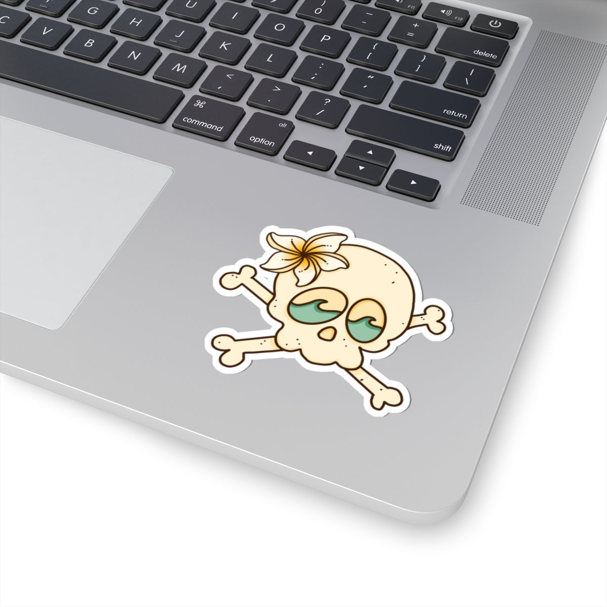 cute beach girl skull sticker with ocean waves, sticker shown on laptop